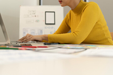 Creative web designer planning UI application and developing digital template