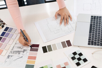 Creative web designer planning UI application and developing digital template