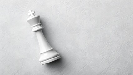 White Chess King Piece on a Textured Light Gray Surface, Strategy Concept