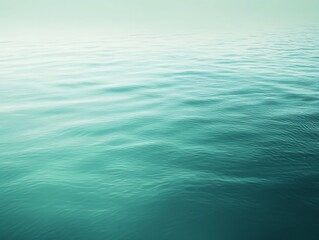 Azure Horizon: The serene expanse of a vast ocean, where the sky gently merges with the water, creating a sense of boundless tranquility and natural beauty. 