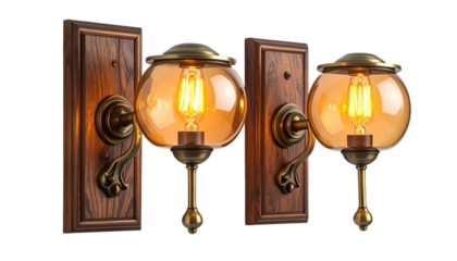 Two ornate sconces glow warmly on dark wooden mounts