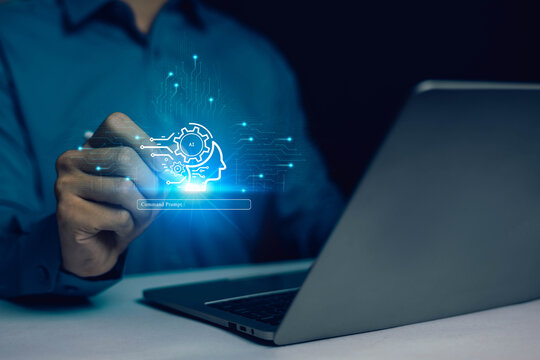 Artificial intelligence concept with human hand using command prompt on laptop, AI brain icon, digital automation, machine learning, data processing, smart technology, business innovation - Powered by Adobe