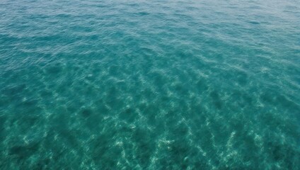 Crystal Clear Turquoise Ocean Water with Sun Reflections.