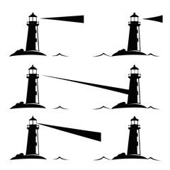Silhouette of lighthouses with beams
