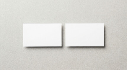 Blank business cards on textured background, showcasing minimalistic design with ample copy space for customization and branding opportunities