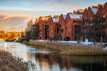 New block houses construction. New brick houses on the river embankment