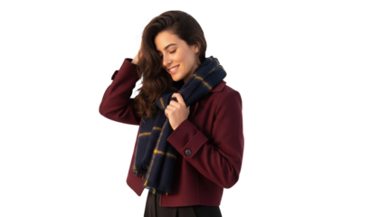 Attractive Hispanic woman in stylish coat with scarf looking down with a warm smile of happiness