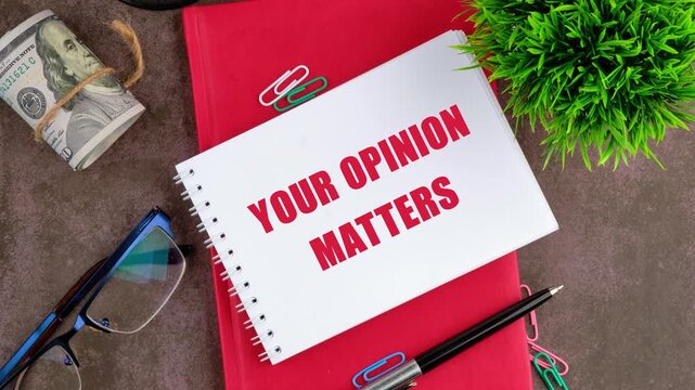 The conceptual text, the phrase YOUR OPINION MATTERS, appears on a blank sheet of notepad. The concept of development, business, finance, marketing