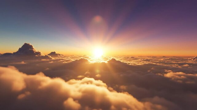 Epic sunrise view above the clouds with sun rays and vibrant colors in the sky, a serene and calming landscape