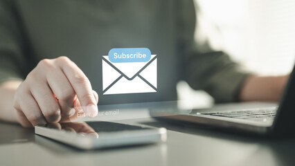 newsletter, signup, form, email, subscribe, A person tapping a smartphone to enter an email for a newsletter subscription, symbolizing digital engagement, lead generation, and online marketing.