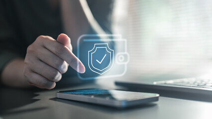 A secure digital wallet concept showing a hand interacting with a smartphone, featuring a protection shield icon, symbolizing safe payments, encryption, identity verification.