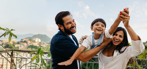 Happy family enjoying quality time outdoors on a sunny day