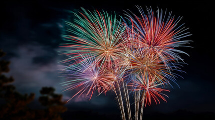 Colorful fireworks burst in night sky, long exposure, festive celebration, vibrant and joyful