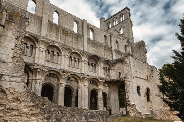 Naklejka premium Interior ruins of Jumieges Abbey with Romanesque arches and stone columns in Normandy, France