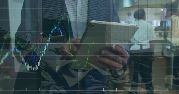 Animation of financial data and graphs over hands of caucasian businessman using tablet