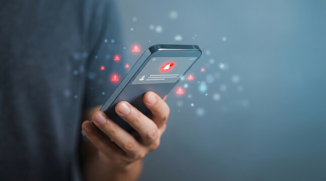 Person holding smartphone with digital data breach insurance protection against cyber attack and security vulnerability secure mobile phone - Powered by Adobe