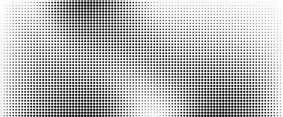 Dotted halftone gradient texture. Fading polka dot background. Repeated dots gradation pattern background.