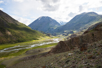 A panorama of rocky slopes and a winding river