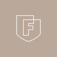 f letter shield protection security logo vector icon illustration