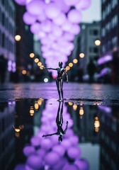 Dancer performing on stage with purple lights representing energy movement and art
