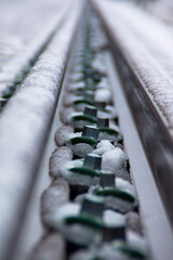 Railroad tracks covered in snow during winter season