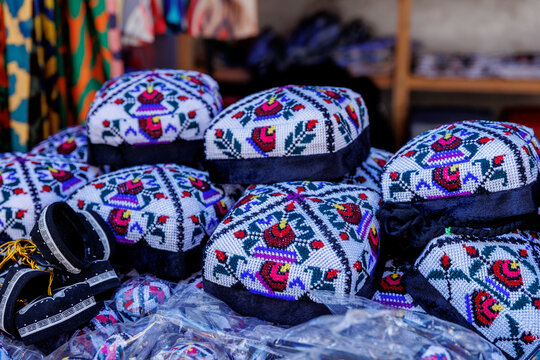 A traditional Uzbek tubeteika hat, decorated with multicolored embroidery. Tashkent, Uzbekistan, Central Asia.