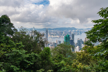 View of Hong Kong and Kowloon from Victoria peak. Panorama of Hong Kong, skyscrapers and nature.