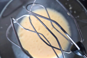Close-Up of Whisk Mixing Batter for Baking Projects or Recipe Illustrations