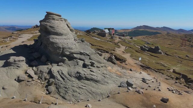 Unique Top Down to Ground Level Aerial Reveal of The Sphinx Rock Formation in Bucegi 4K