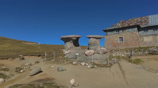 Slow Aerial Push-In to Close-Up of Babele Mushroom Rock Formations Bucegi 4K