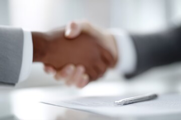 Financial planning success, advisor and investor shaking hands after signing contract