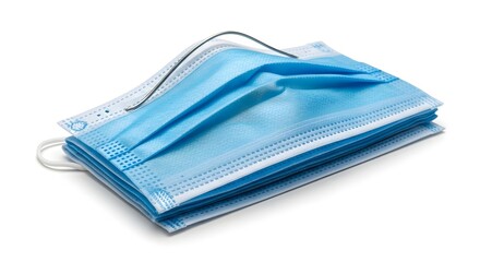 Stack of disposable blue surgical face masks showing the internal bendable nose clip against a clean bright white background for health safety and protection concepts