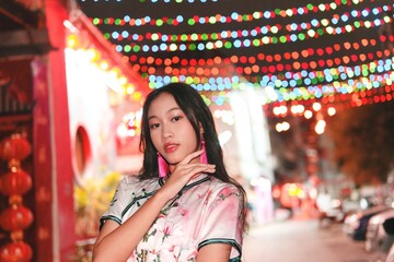 Young Girl in Traditional Dress Celebrates New Year Festivities