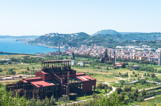 Naples, Italy - 05.01.2025: This site was home to the Ilva (then Italsider) steelworks, now completely abandoned since 1992. There are plans to redevelop this coastline.