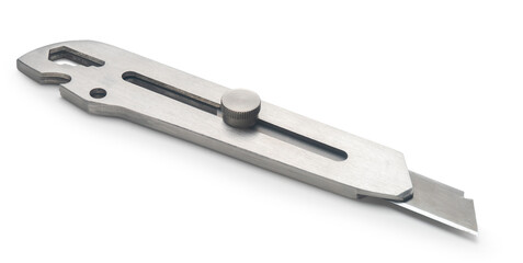 Construction knife close-up on a white isolated background