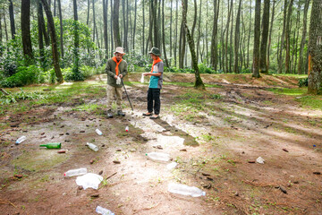 Dedicated Volunteers Cleaning Forest Litter Together for Healthier Planet