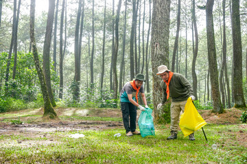 Dedicated Volunteers Actively Cleaning up Forest Litter