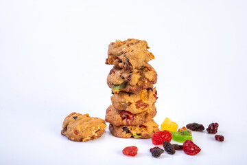 A stack of cookies with freeze dried fruits on white background. Cookies homemade delicious and favorise.