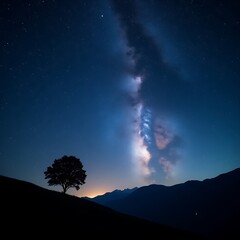 Stunning night landscape with Milky Way galaxy over mountain range
