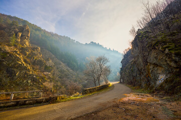 Mountain landscape in the Carpathian Mountains, Romania, Mehedinți, on a snowless winter day.