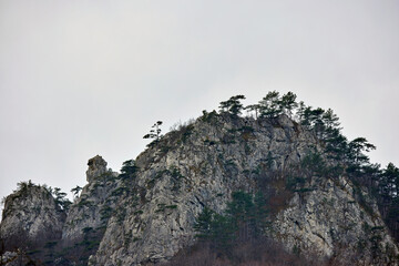 Mountain landscape in the Carpathian Mountains, Romania, Mehedinți, on a snowless winter day.