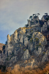 Mountain landscape in the Carpathian Mountains, Romania, Mehedinți, on a snowless winter day.