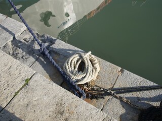 mooring lines at a pier in La Spezia