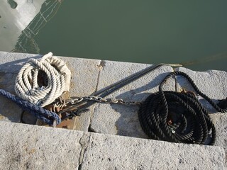 mooring lines at a pier in La Spezia