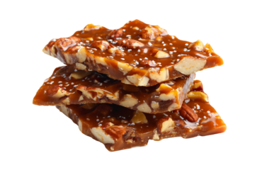 Crispy toffee brittle with walnuts and pecans isolated on transparent background