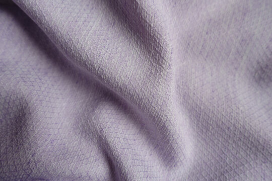 Draped light violet textured viscose pique fabric