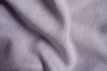 Draped light violet textured viscose pique fabric