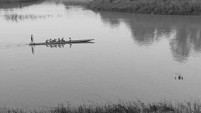 Blurred Long Boat in The River as Black and White Tone with Noise