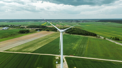 Single wind turbine in countryside field
