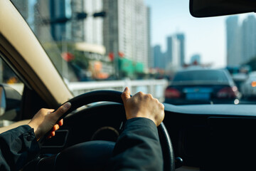 People driving car on city road